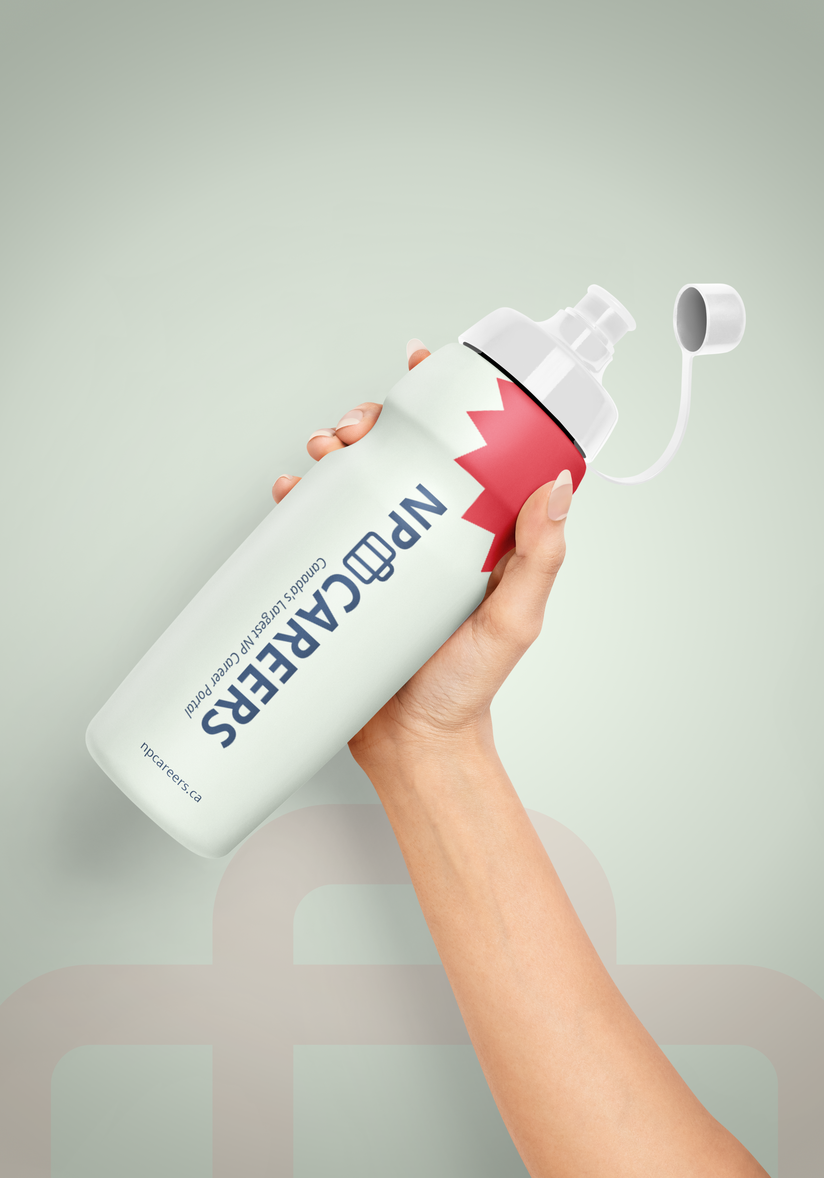 Hand holding NP Careers branded water bottle