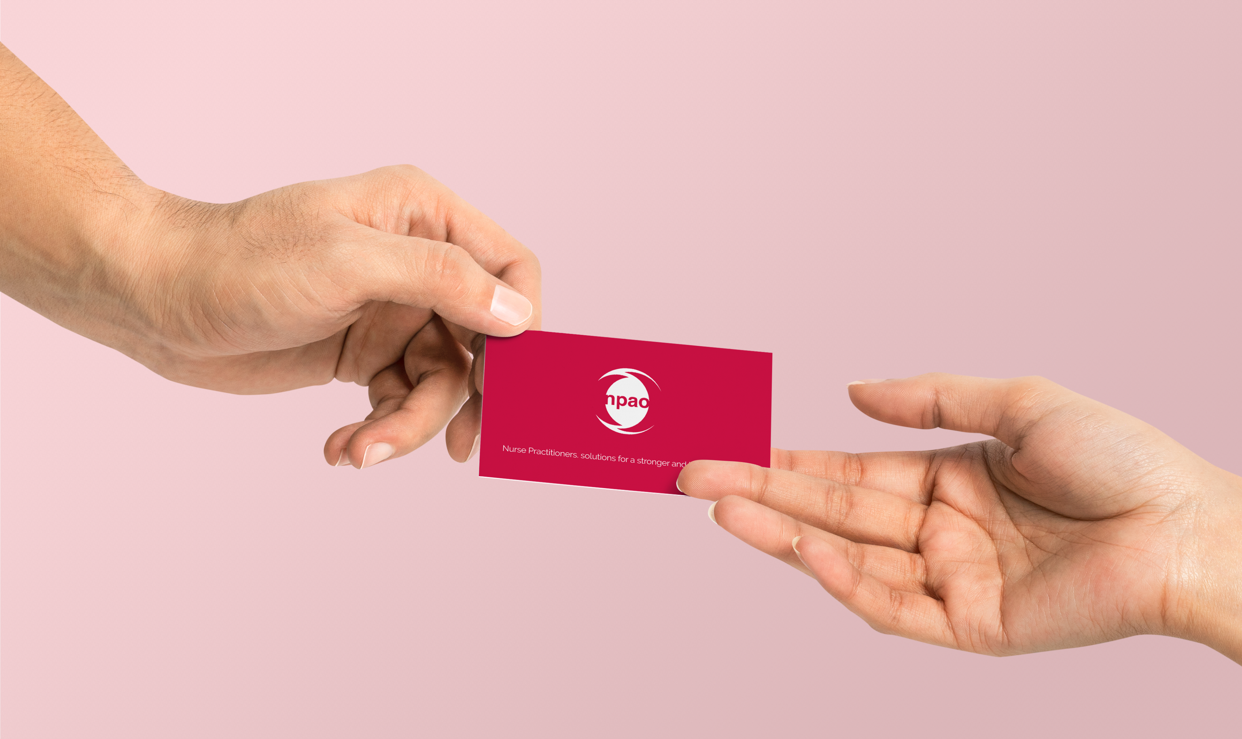 Hands exchanging NPAO business cards