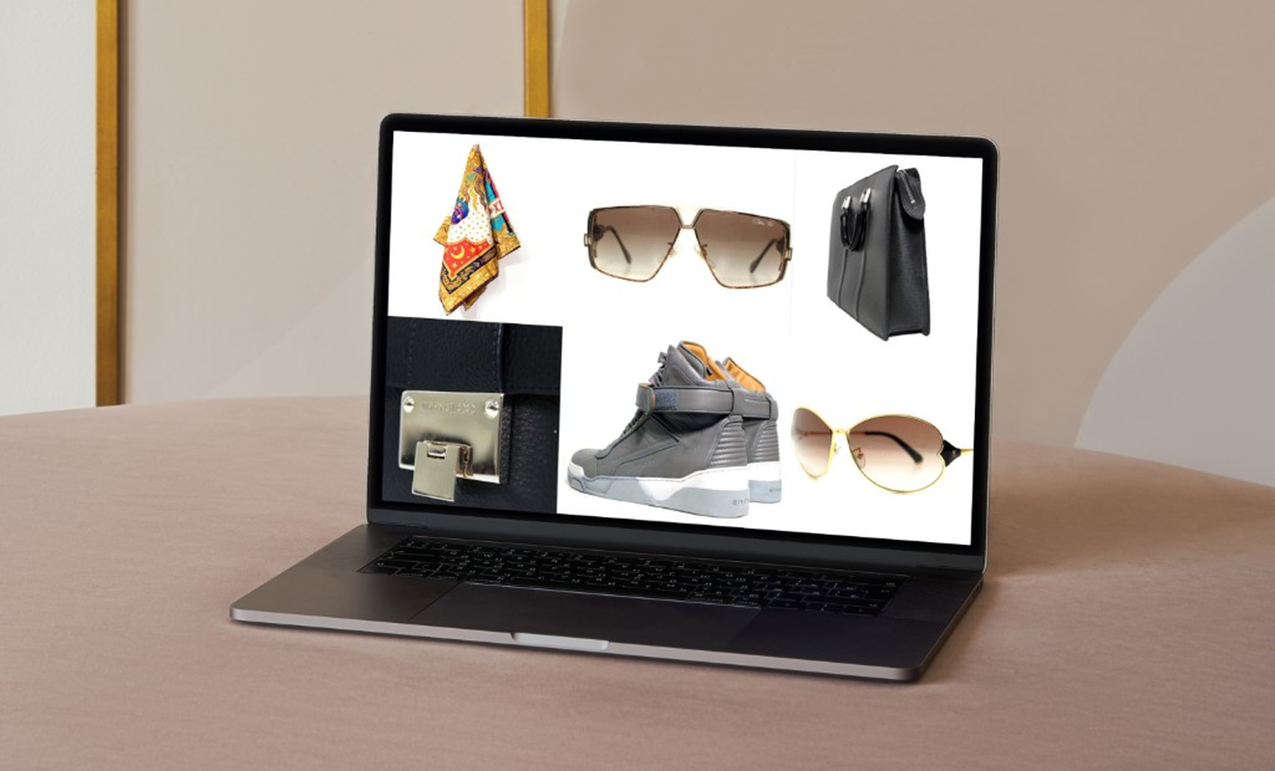 Laptop displaying a grid of product photographs